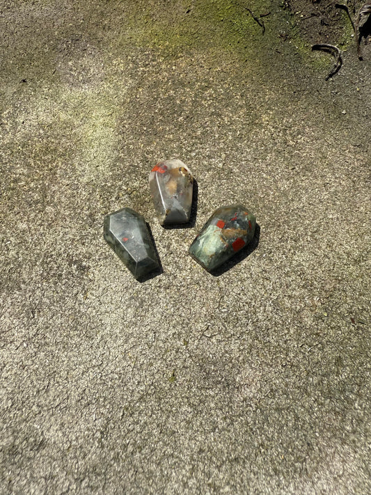 Tiny crystal Coffins