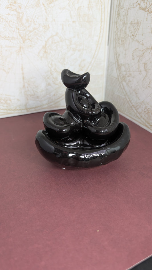 Ceramic backflow burner